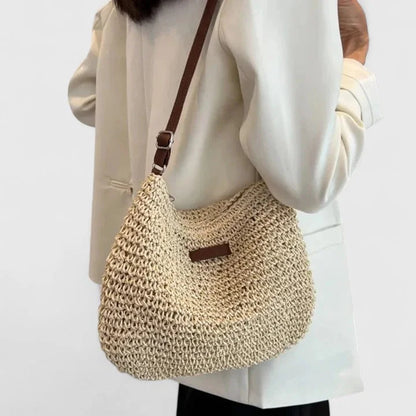Women's woven straw hobo shoulder bag with adjustable faux-leather strap