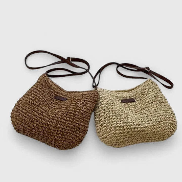 Women's woven straw hobo shoulder bag with adjustable faux-leather strap
