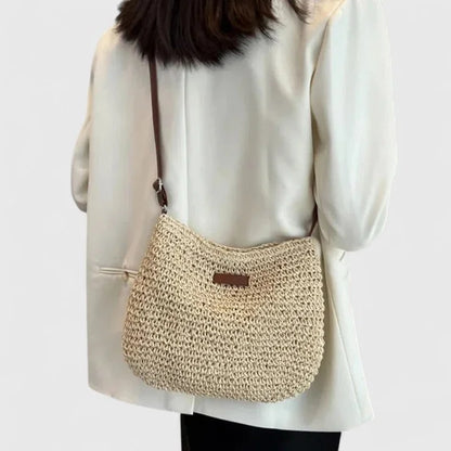 Women's woven straw hobo shoulder bag with adjustable faux-leather strap – Beige